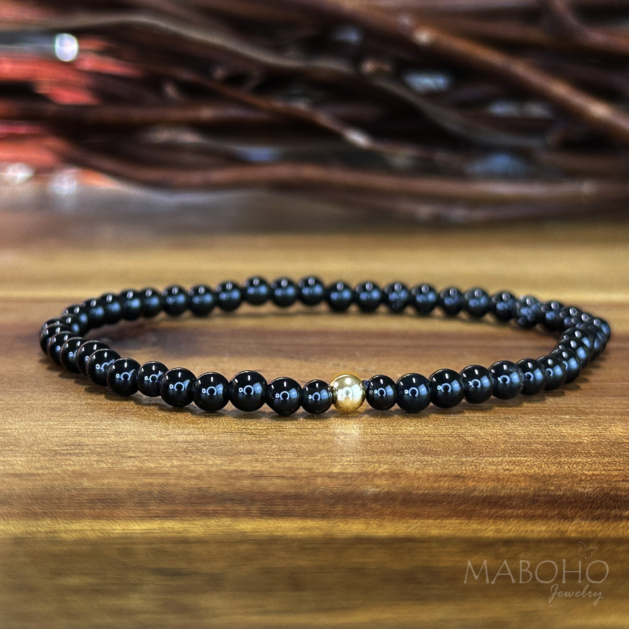 black obsidian 14k gold bracelet