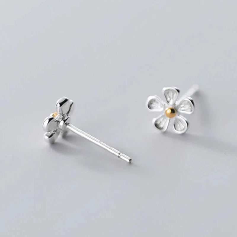 silver daisy earrings April