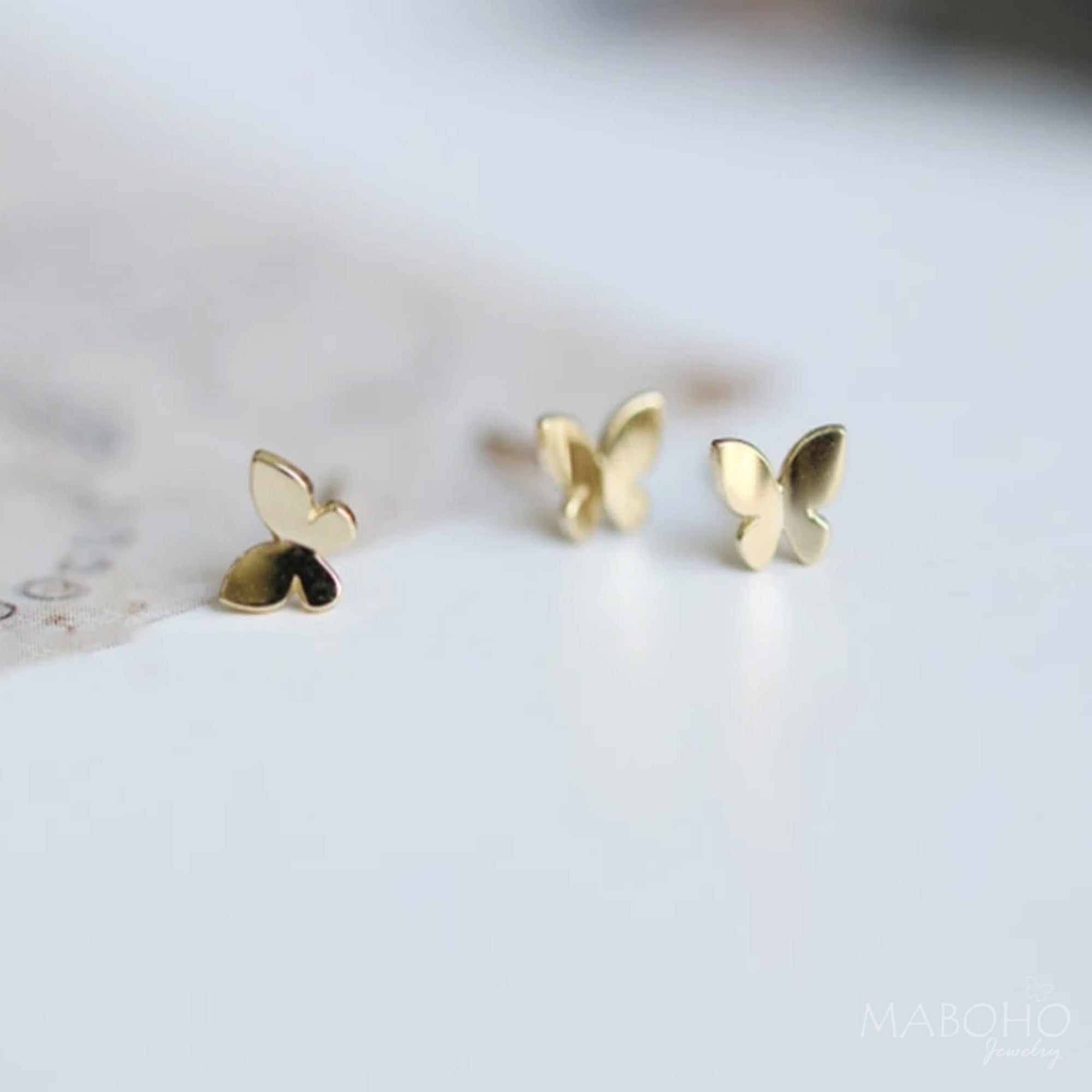 dainty gold butterfly earrings